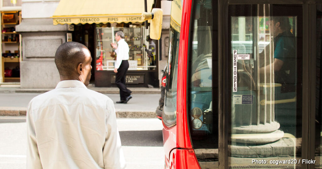 man waiting for a bus