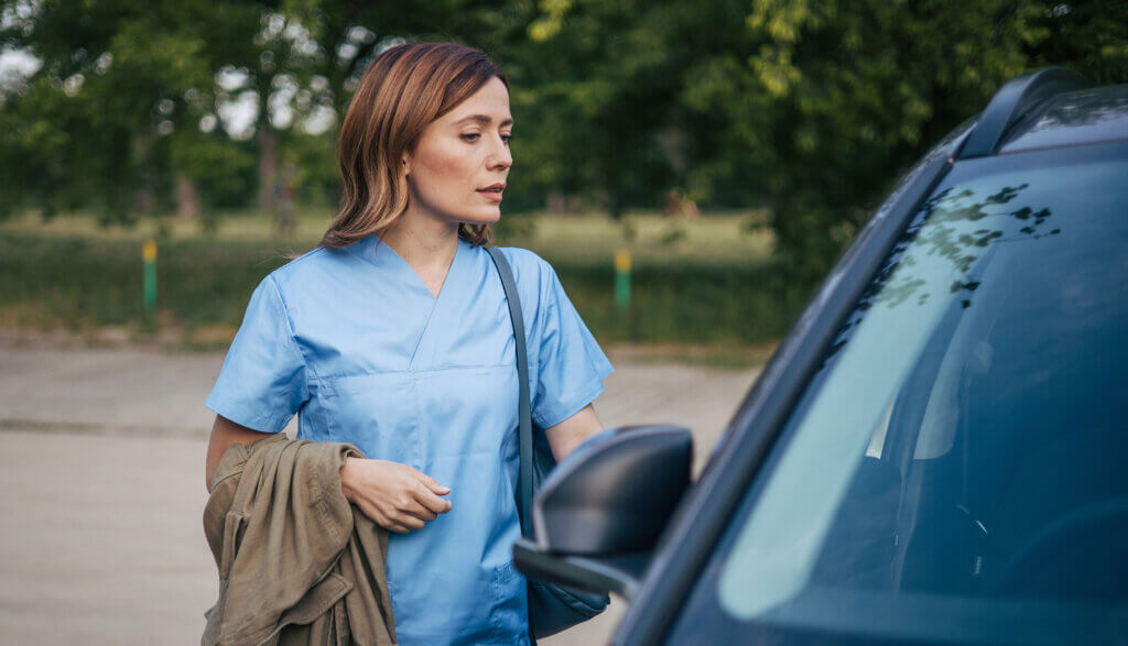 Photo: a care worker with her car.