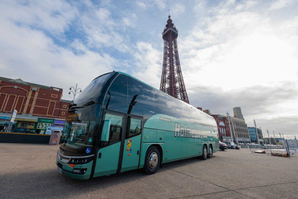 Coach in front of the Blackpool Tower
